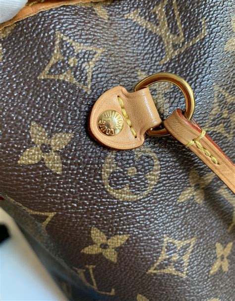 lv coin bag fake